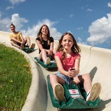 Familienabenteuer auf der Sommerrodelbahn in der Region Hochkönig.  | © Hochkönig Tourismus GmbH