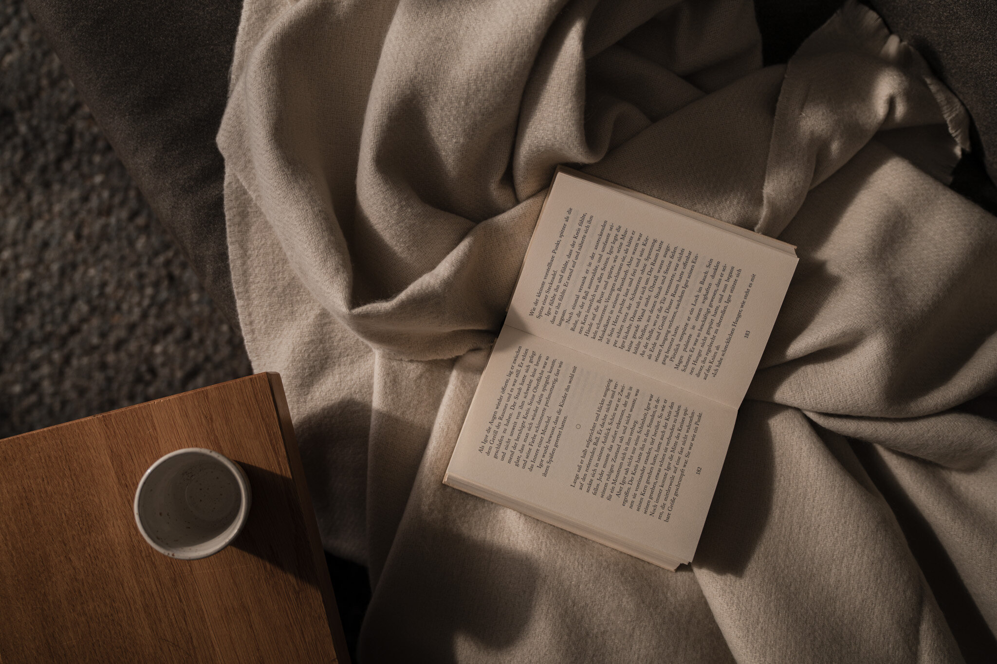 An atmospheric photograph of an open book  | © Karin Pasterer