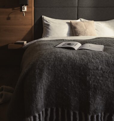 Schlafzimmer im Appartement im Sunnsait | © Karin Pasterer