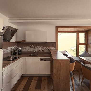 Küche und Essbereich im Appartement im Sunnsait | © Karin Pasterer